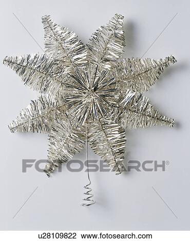 Close-up of silver tinsel Christmas star View Large Photo Image Stock Image - Close-up of silver tinsel Christmas star. Fotosearch