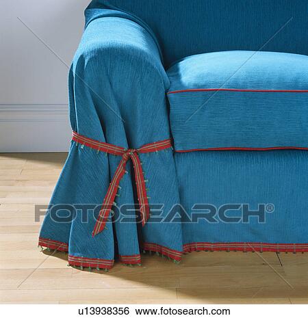 Close-up of sofa with blue loosecover View Large Photo Image Stock Photograph - Close-up of sofa with blue loosecover. Fotosearch