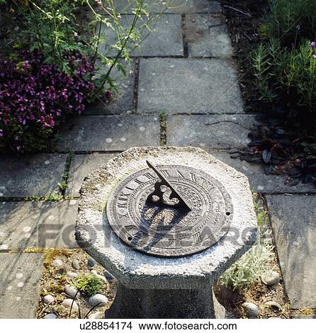 Close-up of sundial on paving View Large Photo Image Picture - Close-up of sundial on paving. Fotosearch