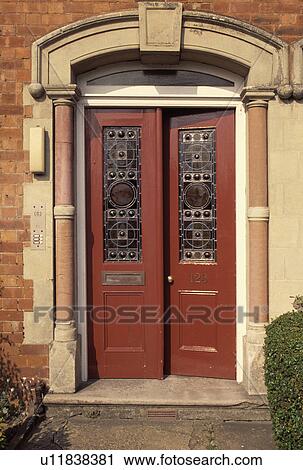 Close-up of traditional front door with stained glass panels View Large Photo Image Stock Image - Close-up of traditional front door with stained glass panels. Fotosearch