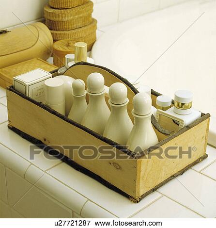 Close-up of white ceramic toiletry bottles in wooden storage box View Large Photo Image Stock Photo - Close-up of white ceramic toiletry bottles in wooden storage box. Fotosearch