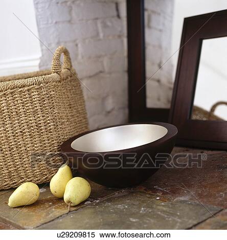 Close-up of wicker basket and green pears beside small black bowl with metallic lining View Large Photo Image Stock Photography - Close-up of wicker basket and green pears beside small black bowl with metallic lining . Fotosearch
