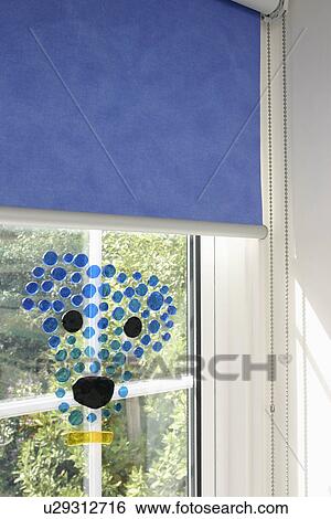 Close-up of window with blue blind and blue+green glass mobile View Large Photo Image Stock Photograph - Close-up of window with blue blind and blue+green glass mobile. Fotosearch