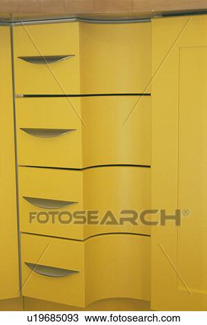 Close-up of yellow kitchen storage unit View Large Photo Image Stock Image - Close-up of yellow kitchen storage unit. Fotosearch