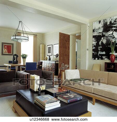 Cream and brown suede sofas in large modern living room View Large Photo Image Stock Photo - Cream and brown suede sofas in large modern living room. Fotosearch