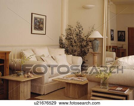 Cream sofas in traditional cream living room View Large Photo Image Stock Photo - Cream sofas in traditional cream living room. Fotosearch