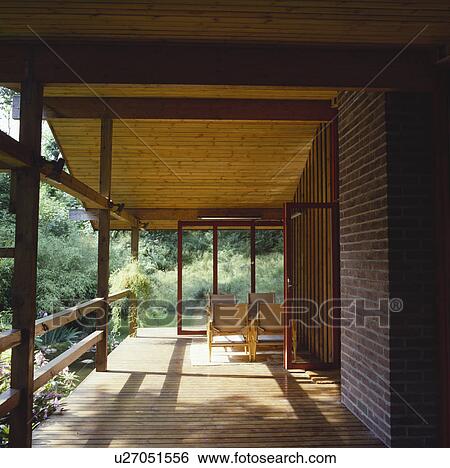 Decked veranda on modern country house View Large Photo Image Stock Photograph - Decked veranda on modern country house. Fotosearch