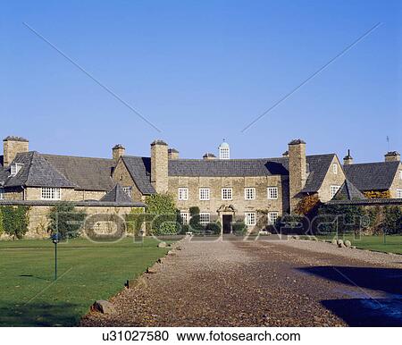Drive leading to walled Georgian manor house View Large Photo Image Stock Image - Drive leading to walled Georgian manor house. Fotosearch