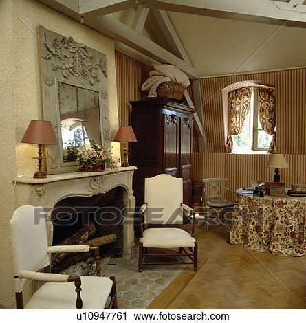 Fireplace in traditional country living room View Large Photo Image Stock Image - Fireplace in traditional country living room. Fotosearch