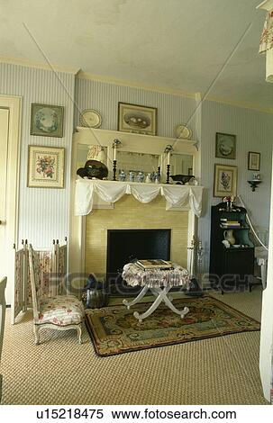 Stock Photography - Fireplace in traditional living room. Fotosearch