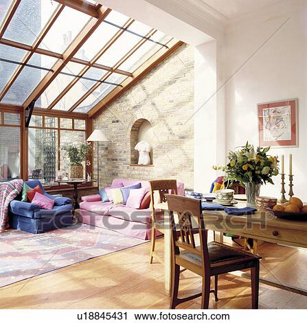 Stock Image - Glazed extension provides additional living space and brings extra light into this terraced house.. Fotosearch