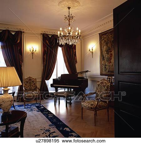 Stock Photography - Grand piano in traditional living room. Fotosearch