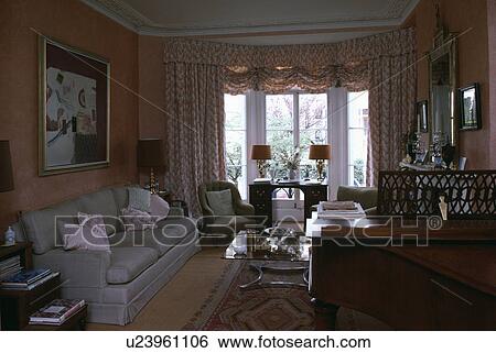 Grey sofa in traditional living room View Large Photo Image Stock Photograph - Grey sofa in traditional living room. Fotosearch