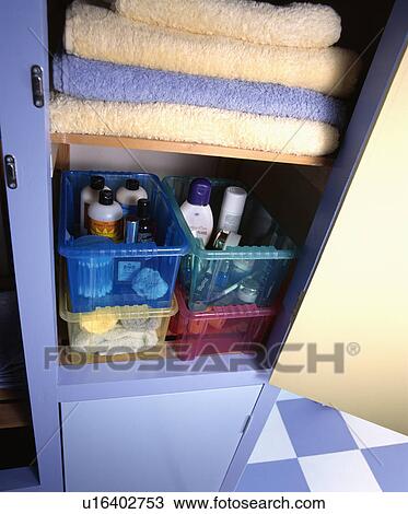 Inside a slim bathroom cupboard View Large Photo Image Stock Image - Inside a slim bathroom cupboard. Fotosearch