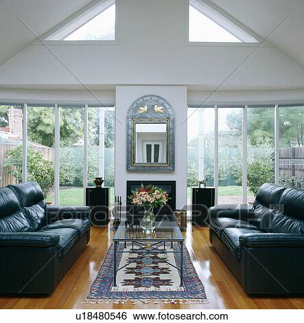 Leather sofas in modern living room View Large Photo Image Stock Photograph - Leather sofas in modern living room. Fotosearch