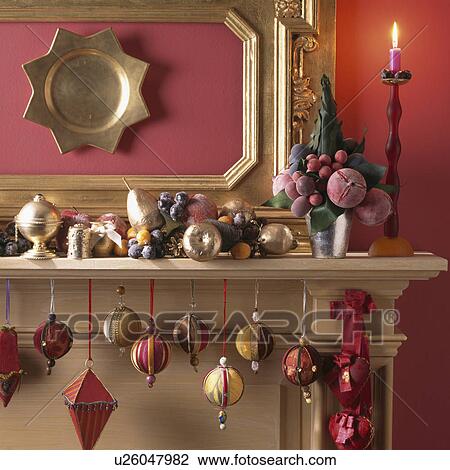 Mantelpiece decorated with red and gold Christmas baubles View Large Photo Image Stock Image - Mantelpiece decorated with red and gold Christmas baubles . Fotosearch