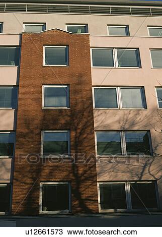 Modern apartment building with plateglass windows View Large Photo Image Stock Image - Modern apartment building with plateglass windows. Fotosearch