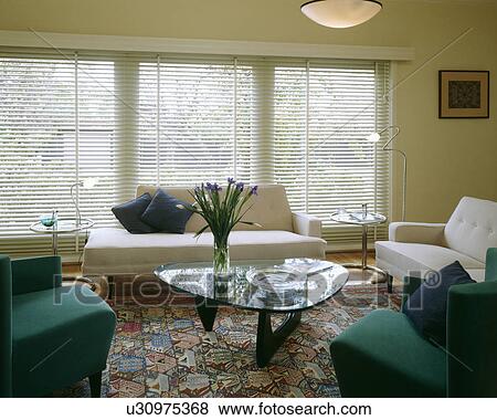Modern white living room with green armchairs and white sofas View Large Photo Image Stock Photo - Modern white living room with green armchairs and white sofas. Fotosearch