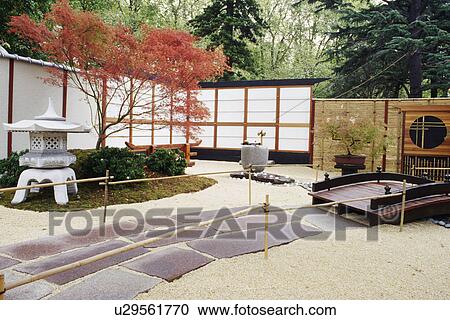 Oriental style enclosed garden with bridge and lantern View Large Photo Image Stock Image - Oriental style enclosed garden with bridge and lantern. Fotosearch