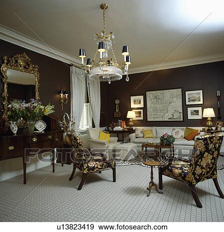 Patterned white carpet in traditional brown living room View Large Photo Image Stock Photo - Patterned white carpet in traditional brown living room. Fotosearch