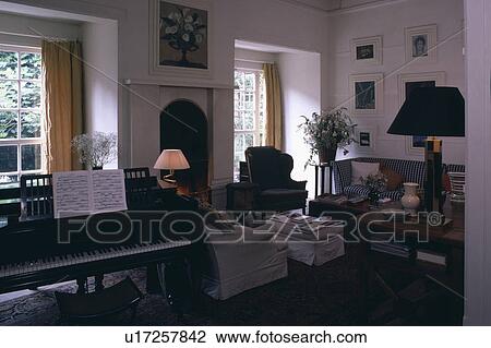 Piano in traditional town living room View Large Photo Image Stock Image - Piano in traditional town living room. Fotosearch