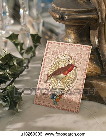 Stock Image - Picture of robin on old-fashioned Christmas card. Fotosearch