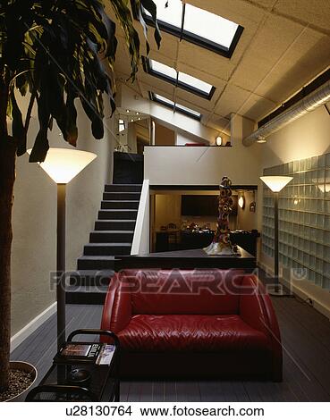 Red leather sofa in modern openplan living room View Large Photo Image Picture - Red leather sofa in modern openplan living room. Fotosearch
