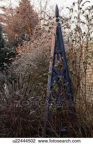Sculpture in country garden in winter View Large Photo Image Stock Image - Sculpture in country garden in winter. Fotosearch