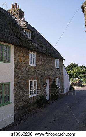 Sideways view of semi detached traditional brick cottage View Large Photo Image Stock Photograph - Sideways view of semi detached traditional brick cottage. Fotosearch