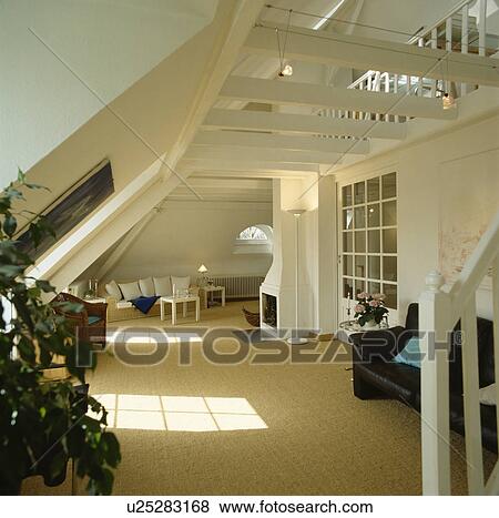 Sisal carpet in modern white loft conversion living room View Large Photo Image Stock Photo - Sisal carpet in modern white loft conversion living room. Fotosearch