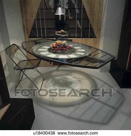 Stock Photo - sittingroom, town, sittingrooms, table, tables, shadow. Fotosearch
