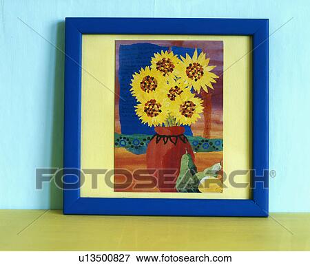 Stock Photo - Small blue-framed painting of sunflowers in red vase . Fotosearch