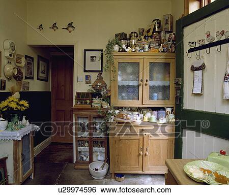 Small Cluttered Glass Fronted Pine Dresser In Old Fashioned