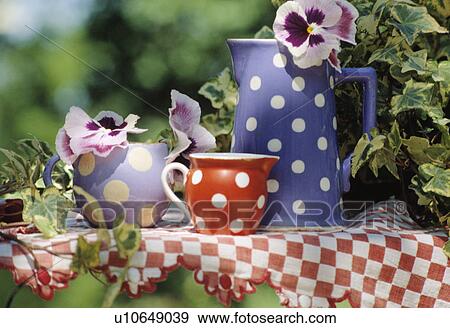 Still-life of blue and red spotted jugs View Large Photo Image Stock Photo - Still-life of blue and red spotted jugs. Fotosearch