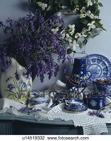 Stock Image - Still-Life of bluebells in jug. Fotosearch