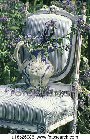 Still-Life of blue+white jug on chair View Large Photo Image Stock Photograph - Still-Life of blue+white jug on chair. Fotosearch