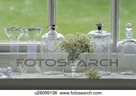 Stock Photograph - Still-Life of glass vases and bottles. Fotosearch