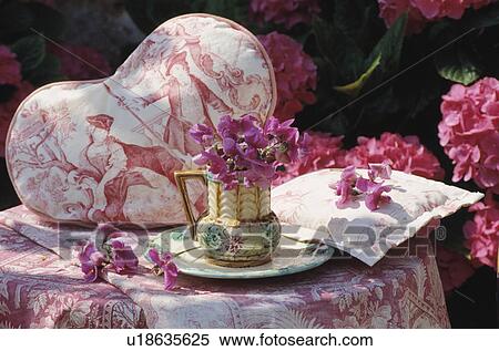 Still-Life of pink Toile de Jouy cushion and sweetpeas View Large Photo Image Stock Photography - Still-Life of pink Toile de Jouy cushion and sweetpeas. Fotosearch