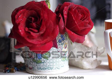 Stock Photograph - Still-life of red roses. Fotosearch