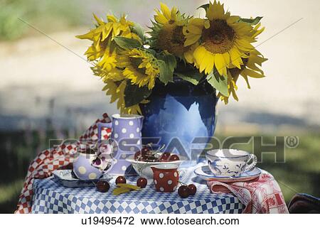 Still-life of sunflowers in vase View Large Photo Image Stock Image - Still-life of sunflowers in vase. Fotosearch