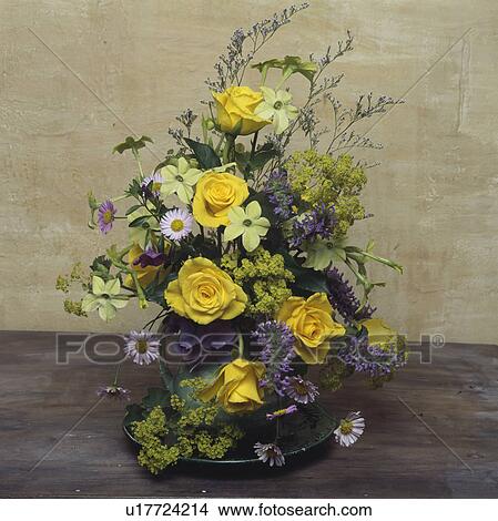 Still-Life of yellow and blue summer floral arrangement View Large Photo Image Picture - Still-Life of yellow and blue summer floral arrangement. Fotosearch