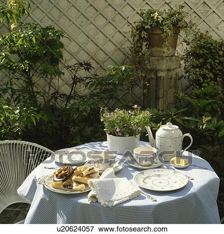 Tea and cakes alfresco. View Large Photo Image Stock Photo - Tea and cakes alfresco.. Fotosearch