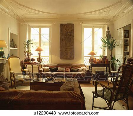 Throw on sofa in traditional living room View Large Photo Image Stock Image - Throw on sofa in traditional living room. Fotosearch