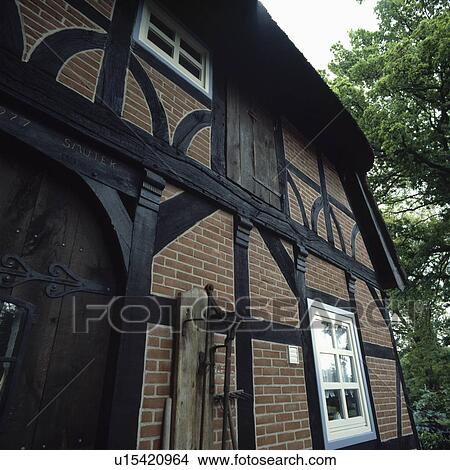 traditional house exterior View Large Photo Image Picture - traditional house exterior. Fotosearch