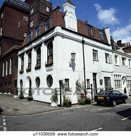 Traditional white terraced town house View Large Photo Image Stock Photo - Traditional white terraced town house. Fotosearch