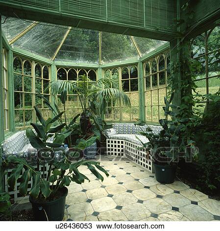 Traditionally designed octagonal conservatory with green rattan blinds and bench seating. View Large Photo Image Stock Image - Traditionally designed octagonal conservatory with green rattan blinds and bench seating.. Fotosearch