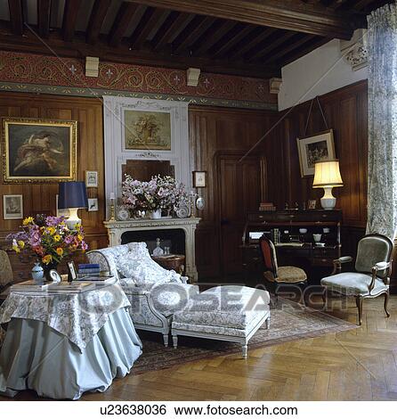 Upholstered chaiselongue in traditional living room View Large Photo Image Stock Photograph - Upholstered chaiselongue in traditional living room. Fotosearch