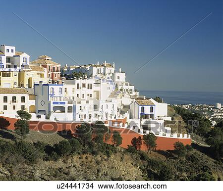 Picture - Villas and apartment buildings in white holiday village in Southern Spain. Fotosearch