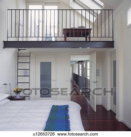 White architectural bedroom with gallery housing bathroom View Large Photo Image Stock Photograph - White architectural bedroom with gallery housing bathroom. Fotosearch