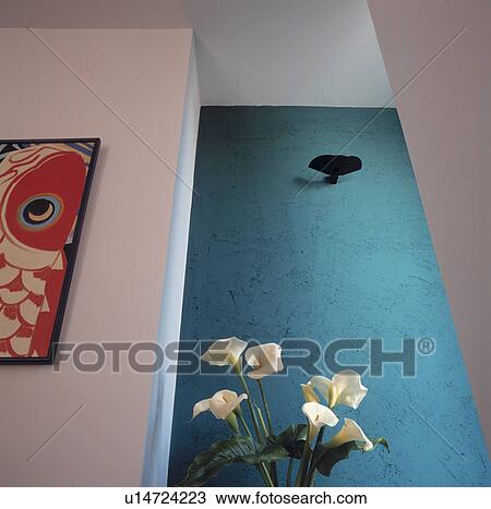 White Arum lilies in front of rough turquoise wall in modern white hall View Large Photo Image Stock Image - White Arum lilies in front of rough turquoise wall in modern white hall. Fotosearch